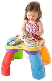 Фото Обучающий столик "Смейся и учись" Fisher Price Развивающие и интерактивные